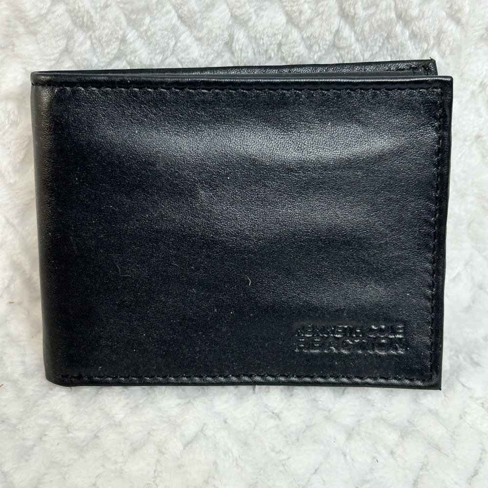 Kenneth Cole Reaction bifold black men’s wallet.